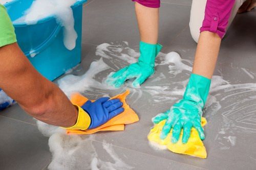 Technician treating a stubborn stain in an Edgware living room