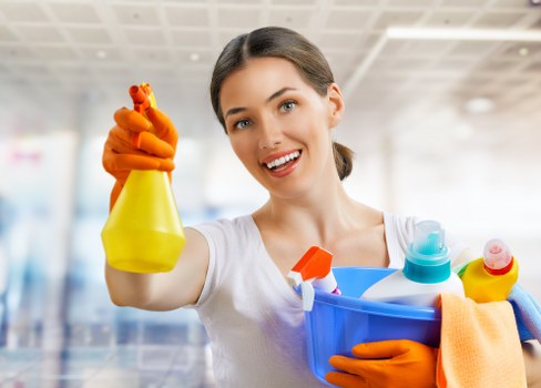 Carpet cleaning technician preparing equipment with safety gear in Edgware