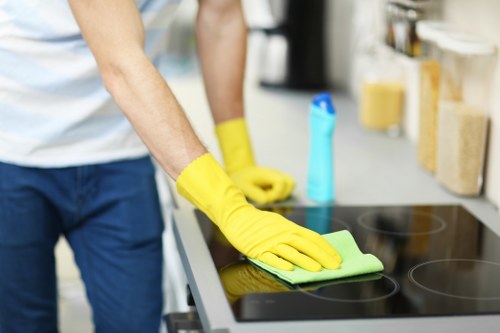 Local cleaner carrying out domestic cleaning in an Edgware property