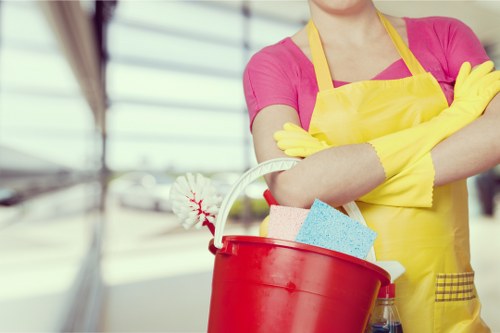 Cleaner preparing an empty property for handover in Edgware